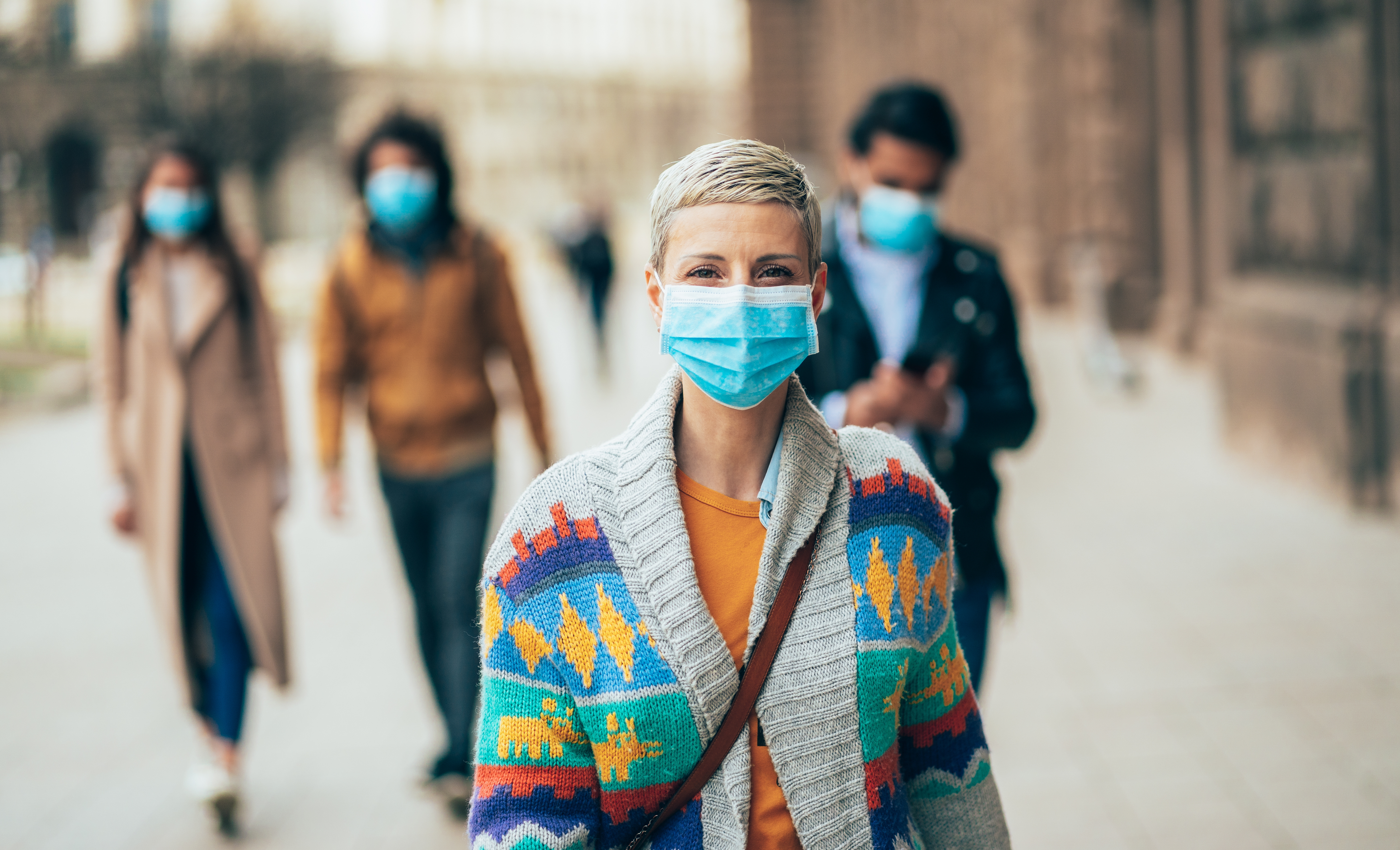 Woman with face protective mask