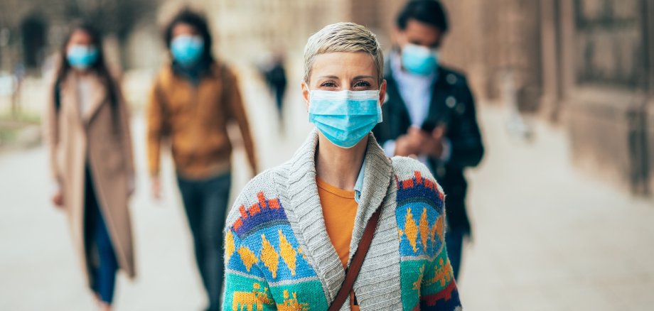 Woman with face protective mask
