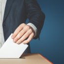 Man Voiter Putting Ballot Into Voting box. Democracy Freedom Concept